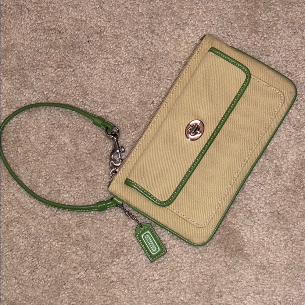 Coach wristlet cream w/ green lining